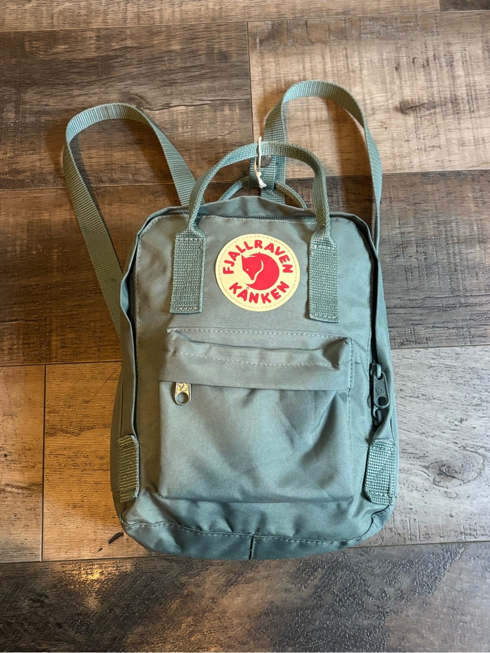 Fjallraven Kanken Mini Backpack in Olive Green with Red Logo